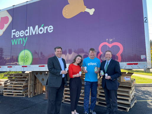Pictured, from left: Ken Kujawa, National Grid regional director; Cate Evans, donor engagement director, FeedMore WNY; DJ Jickster of `97 Rock` and `Rock Out Hunger`; and Christopher Knospe, program manager, government and community relations, NYSEG.