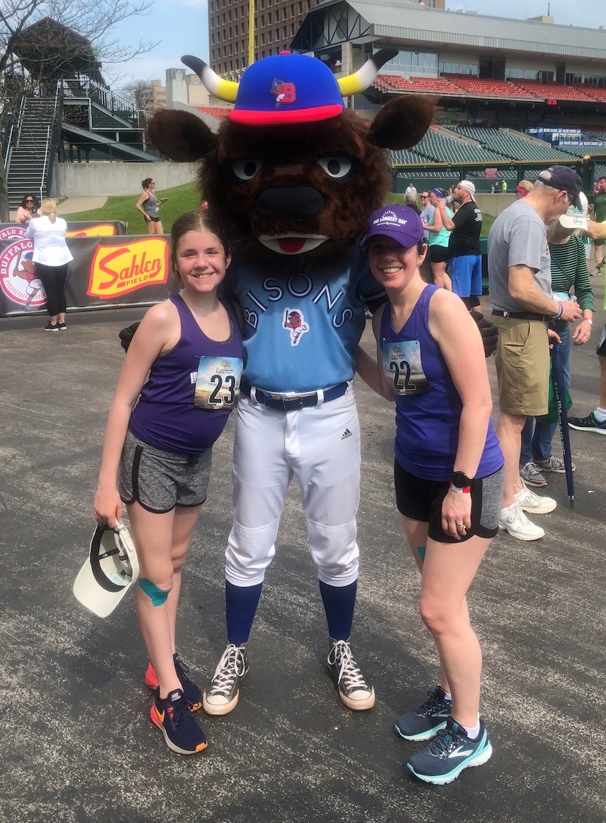 Colleen Croce and her daughter, Olivia, and Buster Bison. (Image courtesy of The Alzheimer's Association Western New York chapter)