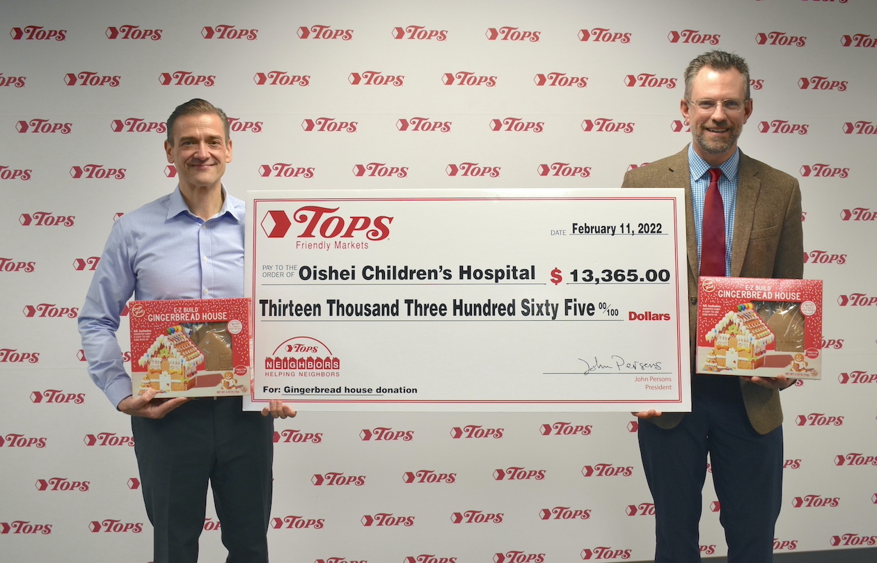 Pictured from left: Tops Friendly Markets President John Persons and The Children's Hospital of Buffalo Foundation Vice President Andrew Bennett. (Submitted photo)