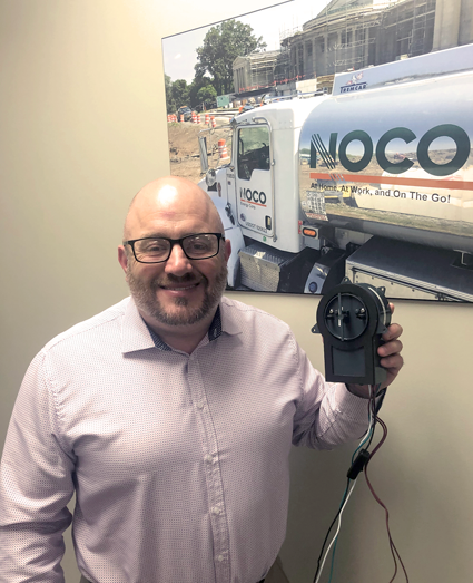 Tom Wrate, GM of NOCO HVAC, with the iWave.
