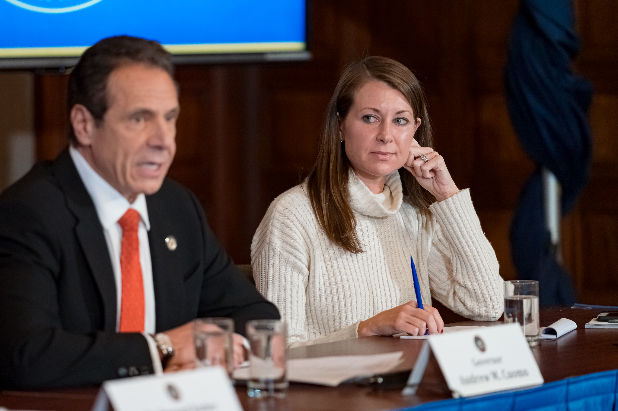 Secretary to the Governor Melissa DeRosa listens as Gov. Andrew Cuomo addresses the media at a press conference on March 6, 2020 (Photo by Mike Wren/Department of Health; courtesy of the Office of Gov. Andrew M. Cuomo)