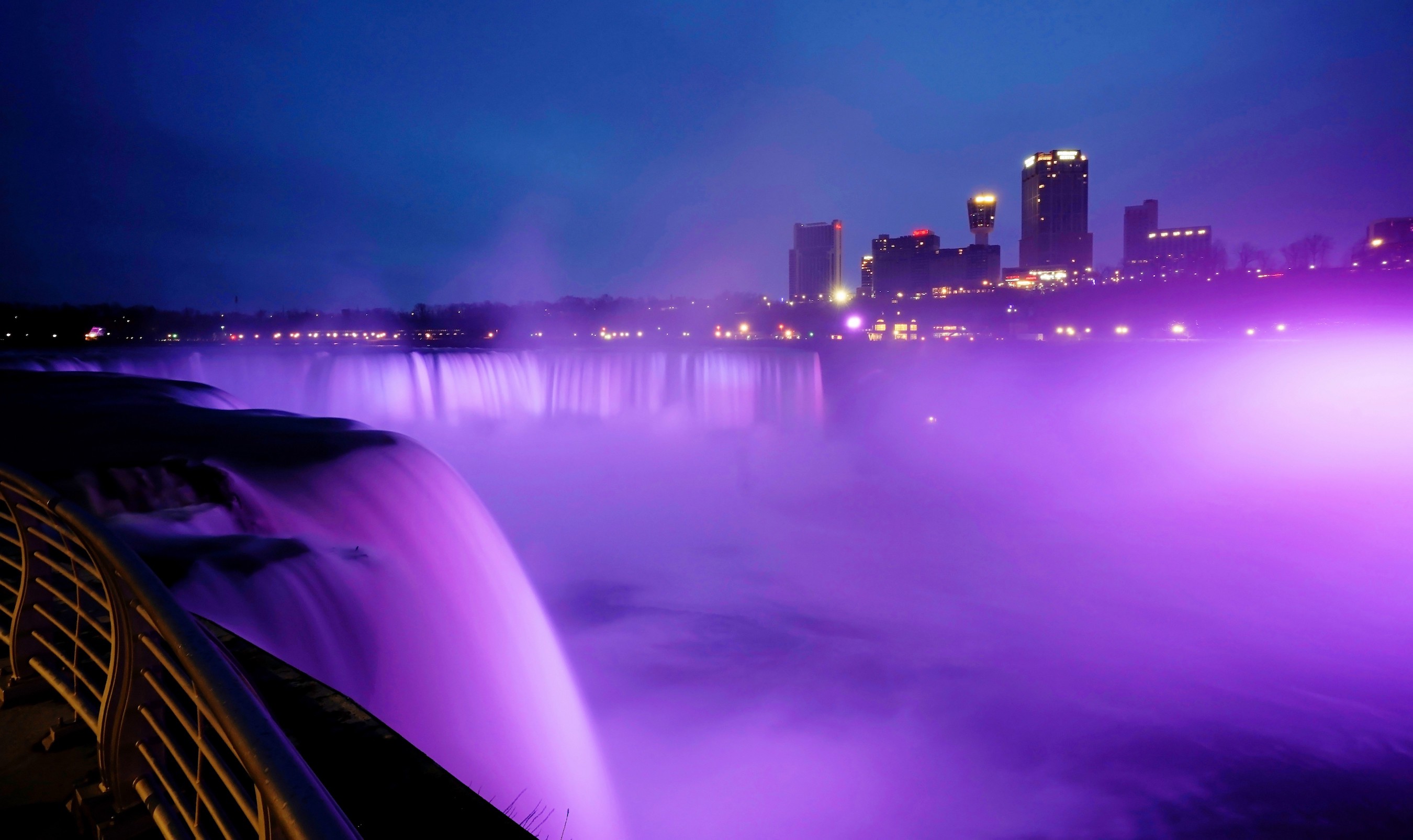 In April, Niagara Falls was illuminated purple for #HospitalityStrong, to honor hospitality industry workers worldwide who have been impacted by the coronavirus pandemic. (File photo by K&D Action Photo and Aerial Imaging)