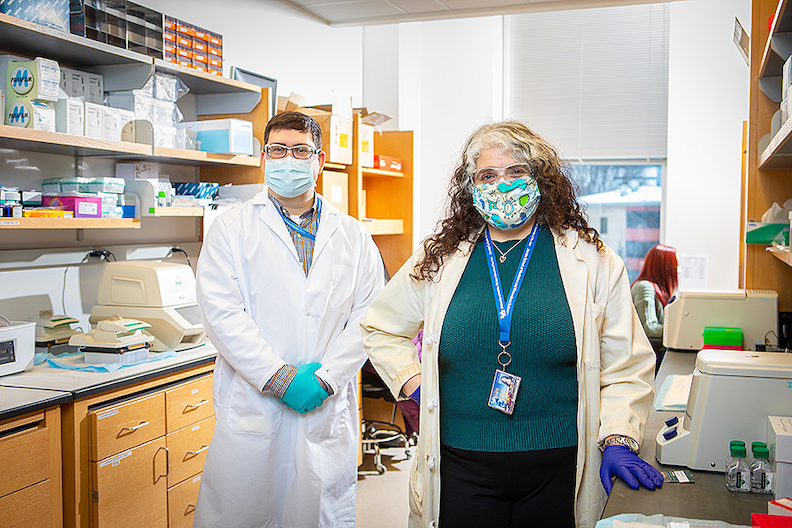 Donald Yergeau, left, is associate director of genomic technologies at the CBLS. Jennifer Surtees is associate professor of biochemistry and co-director of UB's Community of Excellence in Genome, Environment and Microbiome. (University at Buffalo photo)