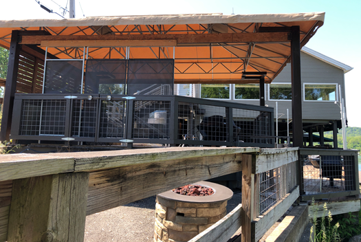 Outdoor seating is available on the patio at Water Street Landing in Lewiston.