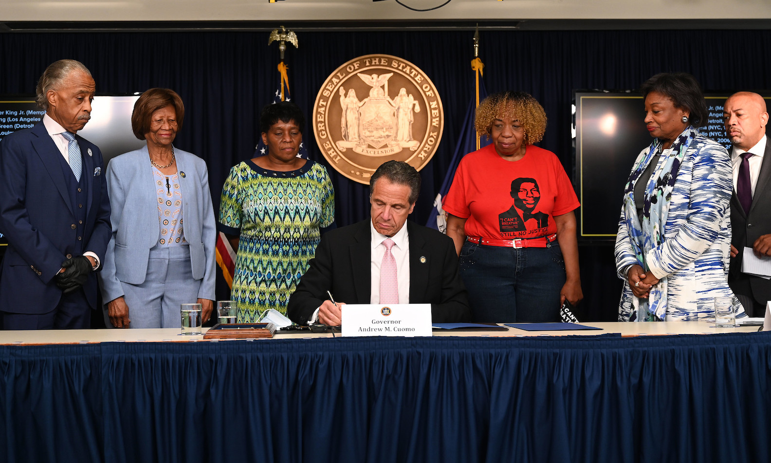 Gov. Andrew M. Cuomo on Friday signed an executive order - the `New York State Police Reform and Reinvention Collaborative` - requiring local police agencies, including the NYPD, to develop a plan that reinvents and modernizes police strategies and programs in their community based on community input. Each police agency's reform plan must address policies, procedures, practices and deployment, including, but not limited to use of force. Joining Cuomo for the bill signing were: the Rev. Al Sharpton, Senate Majority Leader Andrea Stewart-Cousins, Assembly Leader Carl Heastie, Valerie Bell (mother of Sean Bell), Gwen Carr (mother of Eric Garner) and NAACP New York State Conference President Hazel N. Dukes. (Photo by Kevin P. Coughlin/Office of Gov. Andrew M. Cuomo)