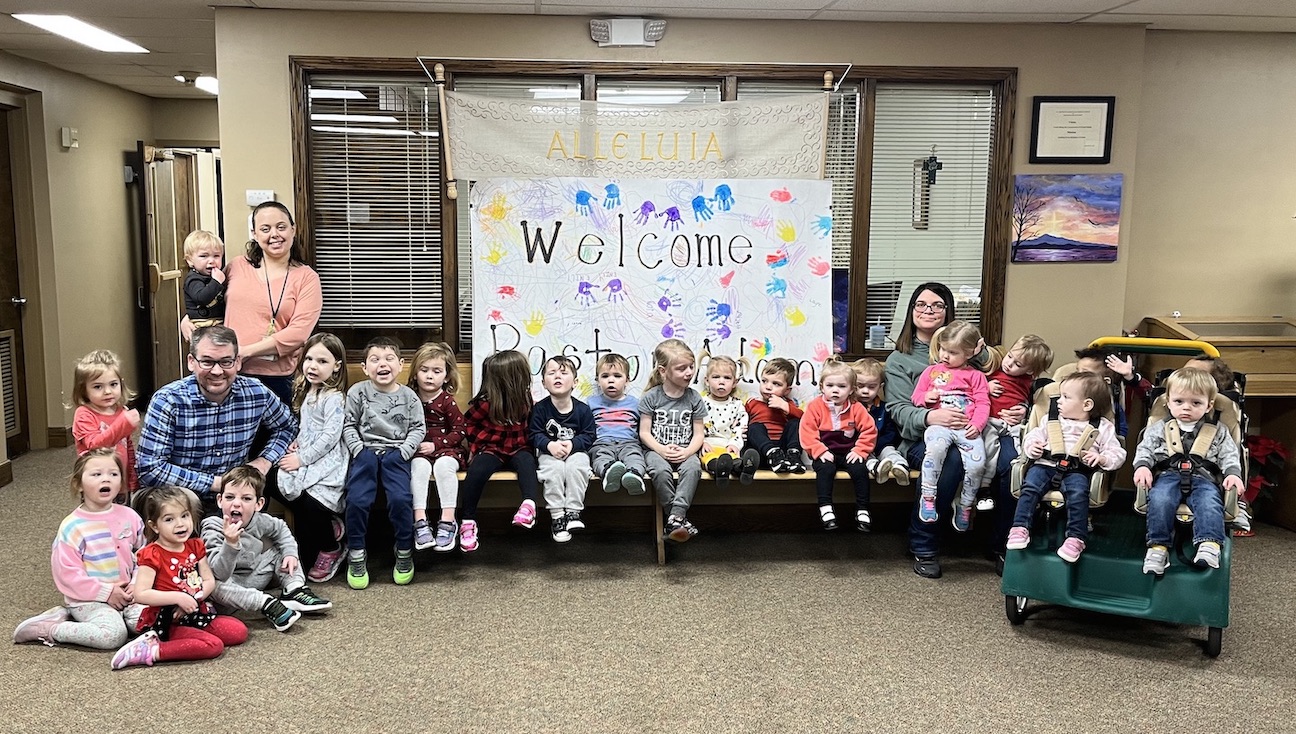 The Rev. Adam Arends with the children from St. Timothy Child Care Center (Submitted).