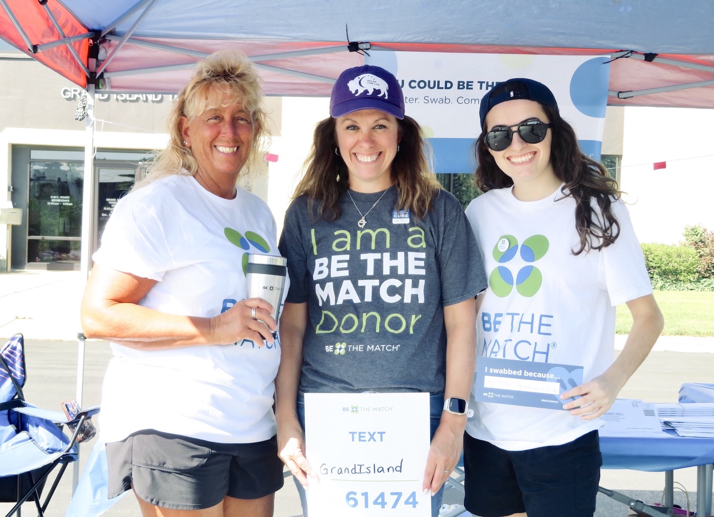 From left: Lynn Dingey, Kim Kalman and her daughter, Genna, at the Sept. 16 Be the Match donor signup drive in front of Town Hall.