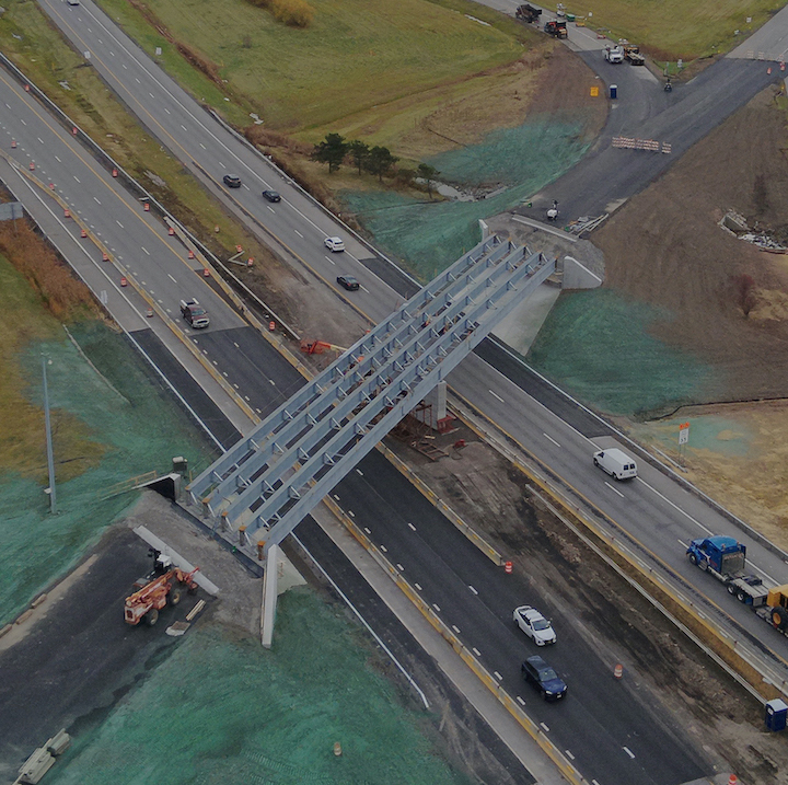 The project to replace the New York State Thruway overpass at Beaver Island Parkway got a boost toward the finish line when the steel installation started last week. (Photos by K&D Action Photo & Aerial Imaging)