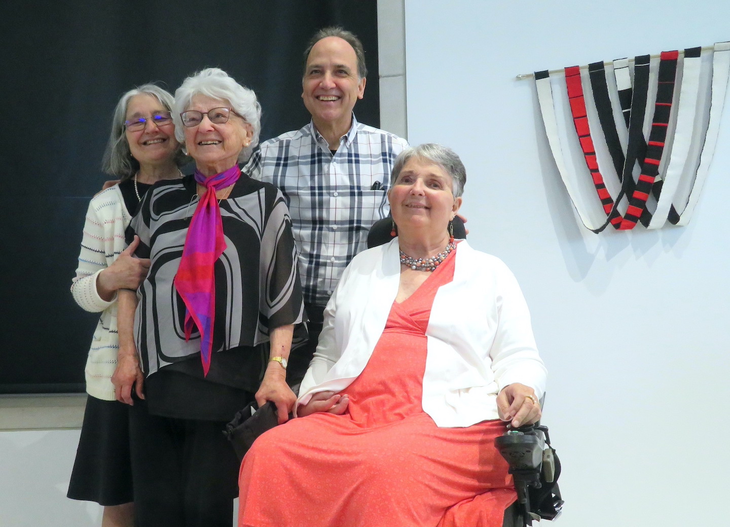Lenore Tetkowski celebrates her 100th birthday at the Burchfield-Penney Art Center with family and friends. Pictured are Tetkowski and her three children: Neil Tetkowski, Diane Pokorski and Mira Berkley.