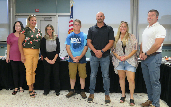 The Grand Island Board of Education thanked John Pedlow, senior custodian at Sidway Elementary School, and John Geblein, maintenance mechanic, who also served temporarily as director of facilities, for the work that they did to get the school buildings and grounds ready for the first day of school on Sept. 7.