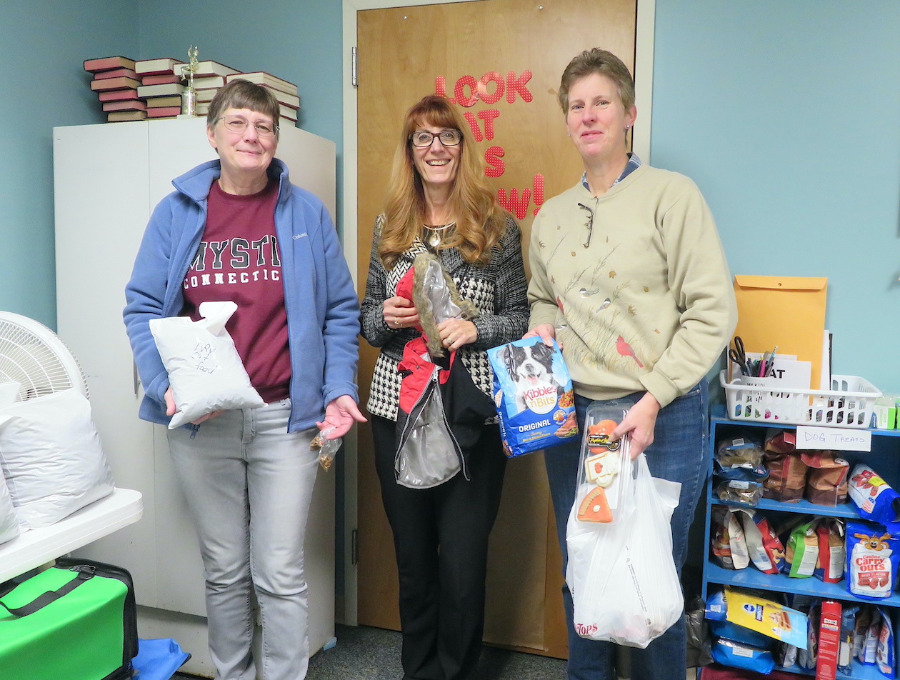 Volunteers at Pete and Skip's Pet food pantry, from left to right, are Jen Hill, Sue Foley and Charlotte Craig.
