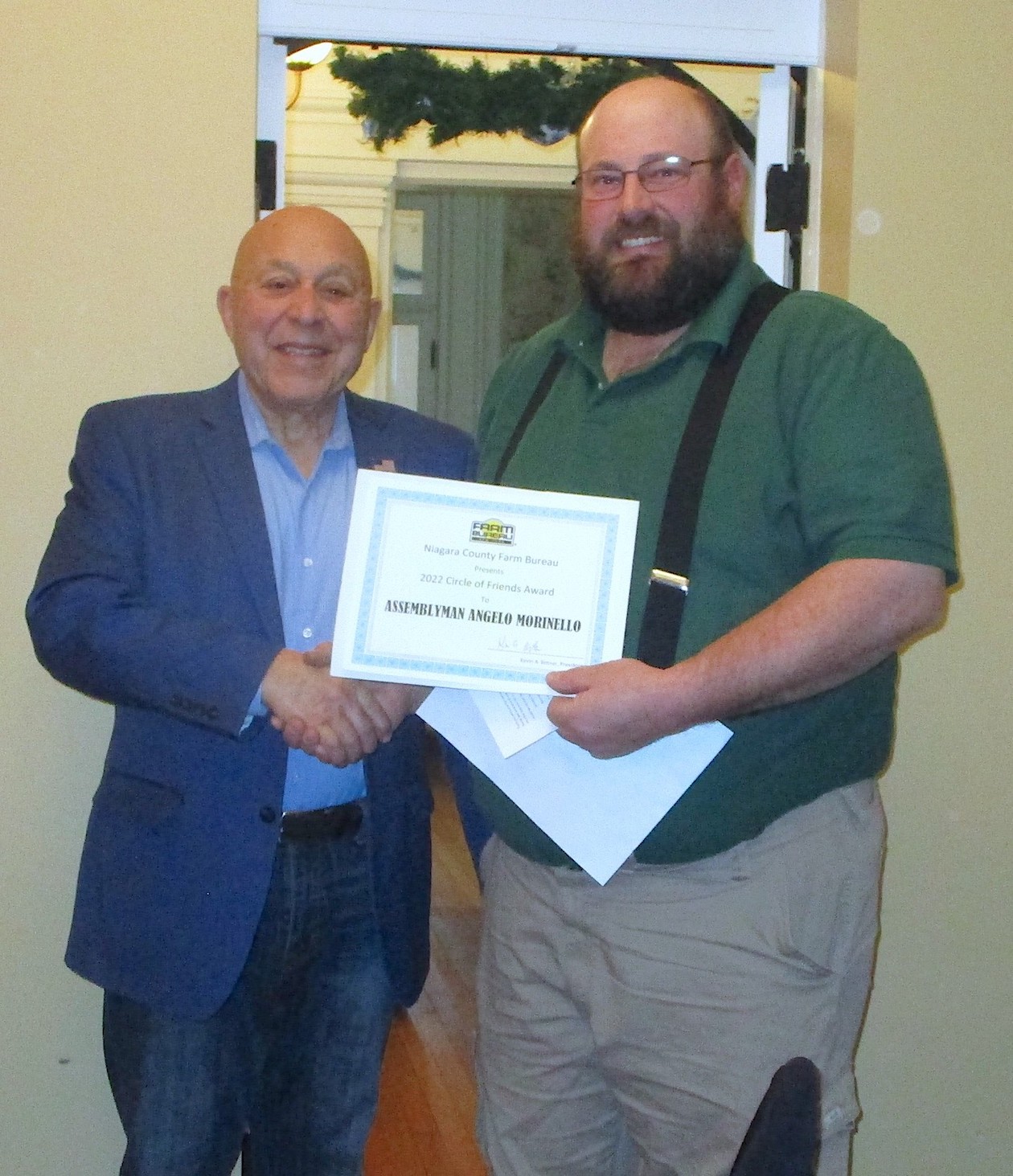 Assemblyman Angelo Morinello accepts his award from Niagara County President Farm Bureau Kevin Bittner. (Submitted photo)