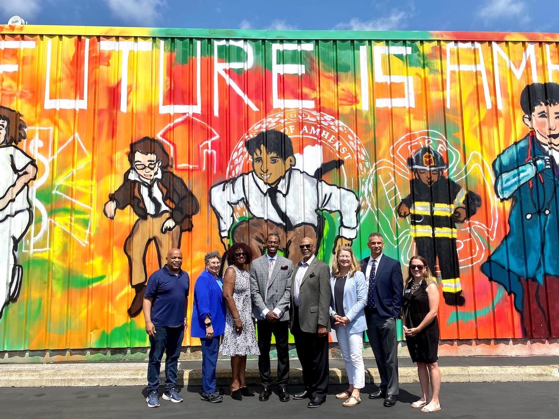 Among those pictured with Speaker Carl Heastie at the Amherst Police Department Community Policing & Training Facility are Assemblymember Karen McMahon, Amherst Police Department Chief Scott Chamberlin, mural artist Jalen Law, and Law's parents. (Submitted)