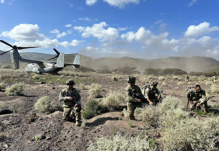 New York Army National Guard soldiers, assigned to Joint Task Force Wolfhound, disembark from a Marine Corps V-22 during training in Djibouti on April 4. (Submitted photo)