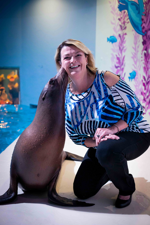 Christine Lorenz with a special friend. (Photo courtesy of the Aquarium of Niagara)
