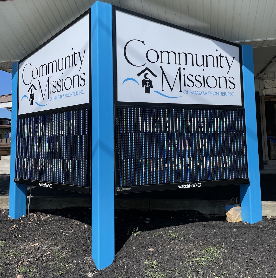 The new signs outside of Community Missions.
