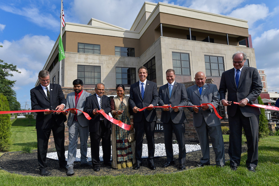 Gov. Andrew M. Cuomo announces the grand-opening of new, $12.8 million Courtyard by Marriott Hotel on 900 Buffalo Ave., Niagara Falls. The project converted the vacant, 69,700-square-foot former Moore Business Forms office building into an 82-room hotel. (Photo courtesy of the governor's Flickr page)