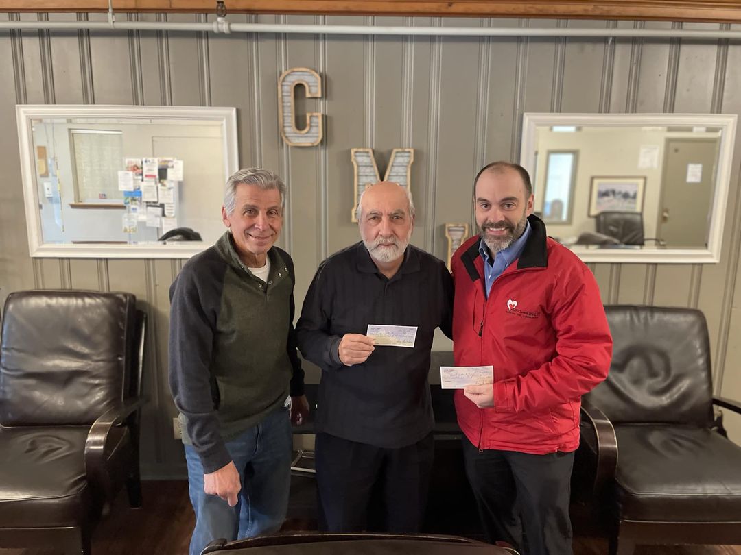 Pictured, from left: Angelo Sarkees, Deposits for Food founder; Joe Sbarbati, agency vice president, Community Missions; and Mark Baetzhold, executive director of Heart, Love & Soul Food Pantry and Dining Room.