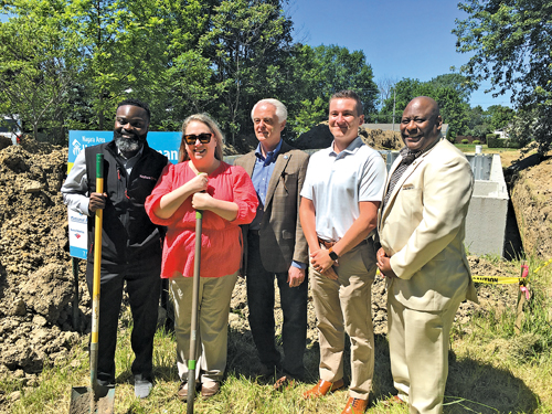 Habitat for Humanity celebrates the groundbreaking on their newest home in Niagara Falls. Pictured (left to right), Chiwuike Owunwanne of KeyBank, Habitat Executive Director Gina Beam, Niagara Falls Mayor Robert Restaino, Jeff Kwiatowski of National Fuel, and Fourth District Niagara County Legislator Jeffery Elder. (Submitted photo)