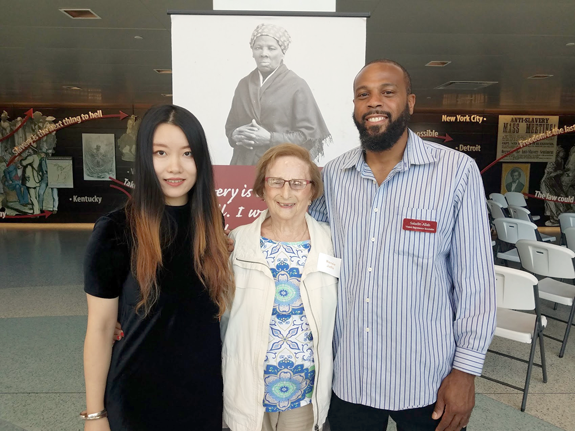 From left: Bei Jian, a Niagara Falls Underground Railroad Heritage Center visitor experience specialist; Renee Joffe, a Holocaust survivor; and Saladin Allah, a Niagara Falls Underground Railroad Heritage Center visitor experience specialist.