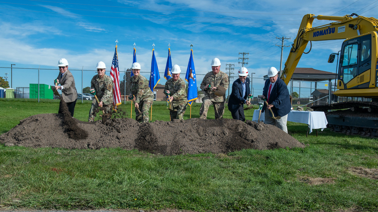 Pictured, from left: Ian Butt, vice president of Butt Construction Co.; Col. Christopher Witter, 914th Mission Support Group commander; Col. Lara Morrison, 914th Air Refueling Wing commander; Command Chief Master Sgt. Scott Peters, 914 ARW; Lt. Col. William Gourlay, 914th Security Forces Squadron commander; Tom Kaiser, U.S. Army Corps of Engineers; and John Cooper, Niagara Military Affairs Council chairman. The guests use the traditional golden shovel for the main gate renovation project groundbreaking ceremony at the Niagara Falls Air Reserve Station on Tuesday. (U.S. Air Force photo by Peter Borys)
