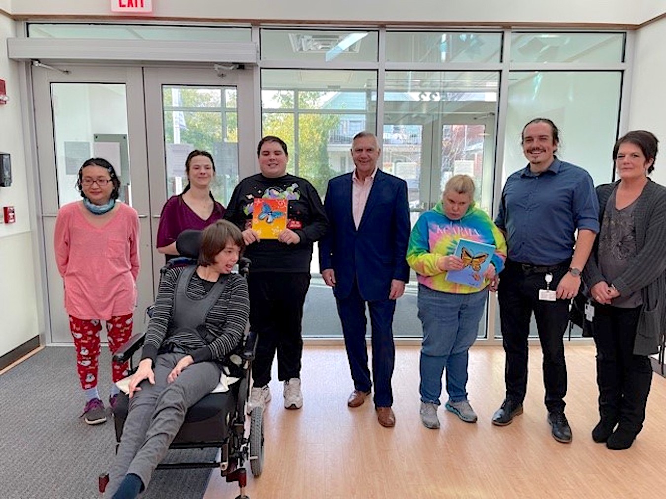 Pictured, from left: Nan; Jodie; Meghan; Mark, Joseph Ruffolo; Mackenzie; and Mike O'Shea, senior day supervisor, and Jill Magno, program director, for the People Inc. Artisan's Edge program.