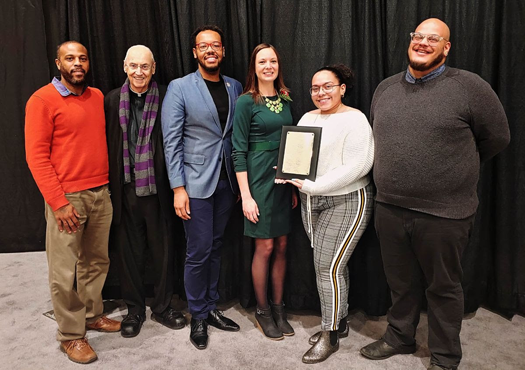 Pictured are: Saladin Allah, visitor experience specialist; the Rev. Joseph L. Levesque, C.M., former Niagara University president; Kent Olden, NFUGRRHC board member; Ally Spongr, interim director; Kiara Santiago, visitor experience specialist; and Evan Wright, guest services manager.