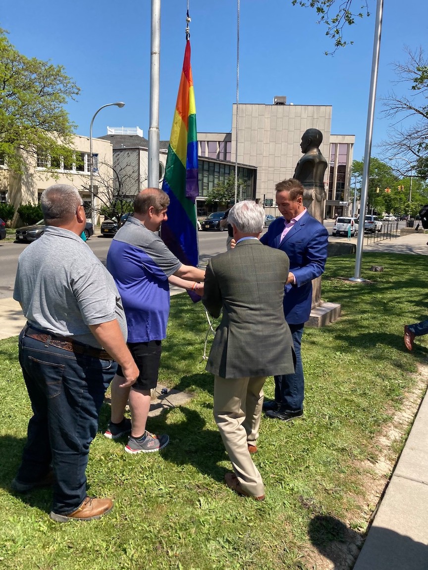 Elected leaders and Niagara County Pride members team to raise a Pride Month flag in Niagara Falls. (Submitted photo)