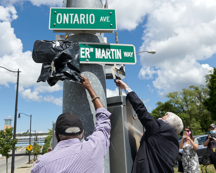 A sign officially honoring John `Spider` Martin was officially revealed on Friday. (Photos by Mark Williams Jr.)