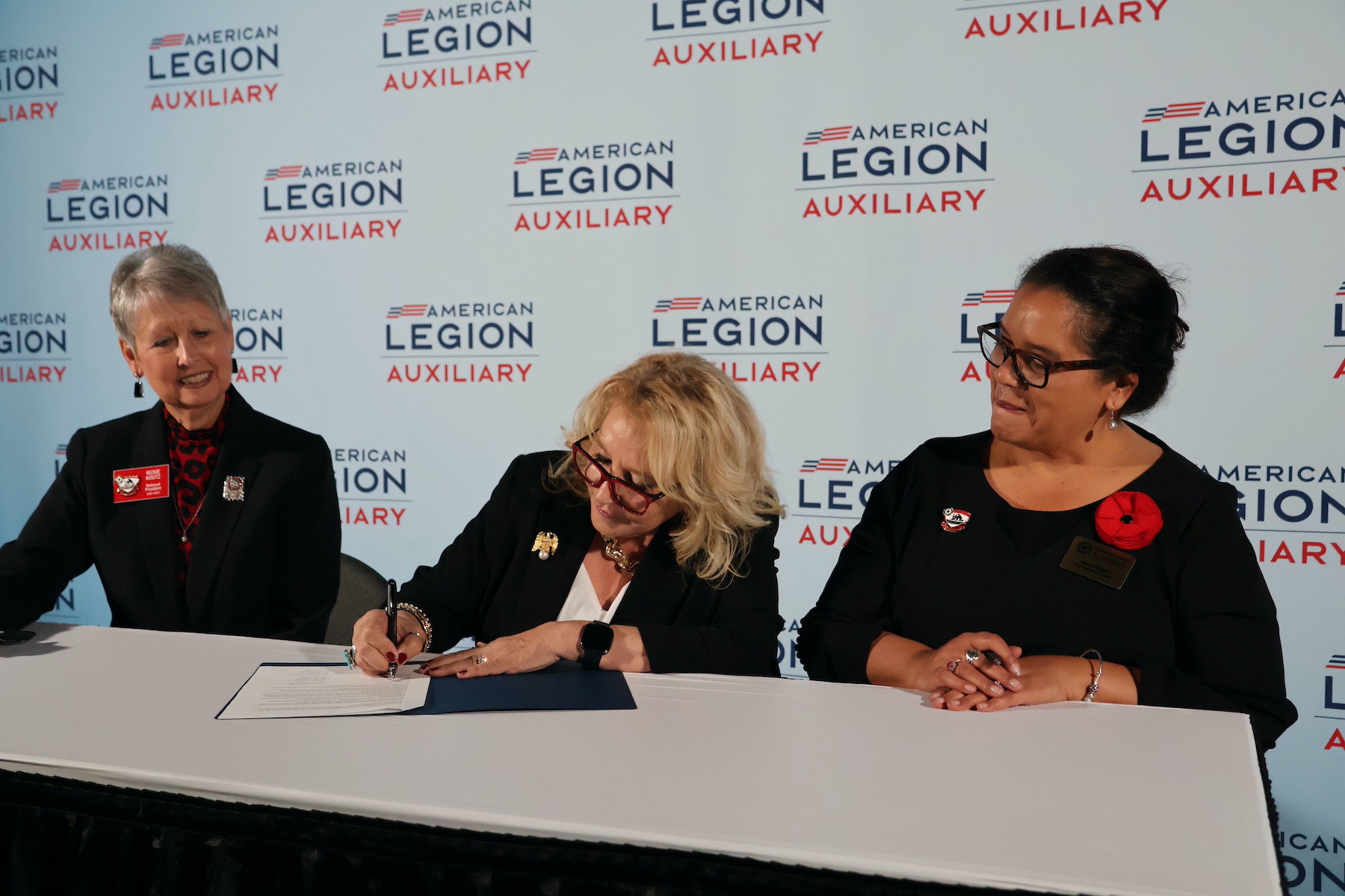 WAA Executive Director Karen Worcester, center, and Vickie Koutz, 2023-24 ALA national president, signed an MOU and jointly announced it their membership as part of the American Legion Auxiliary's 102nd National Convention held in Charlotte, North Carolina. (Submitted)