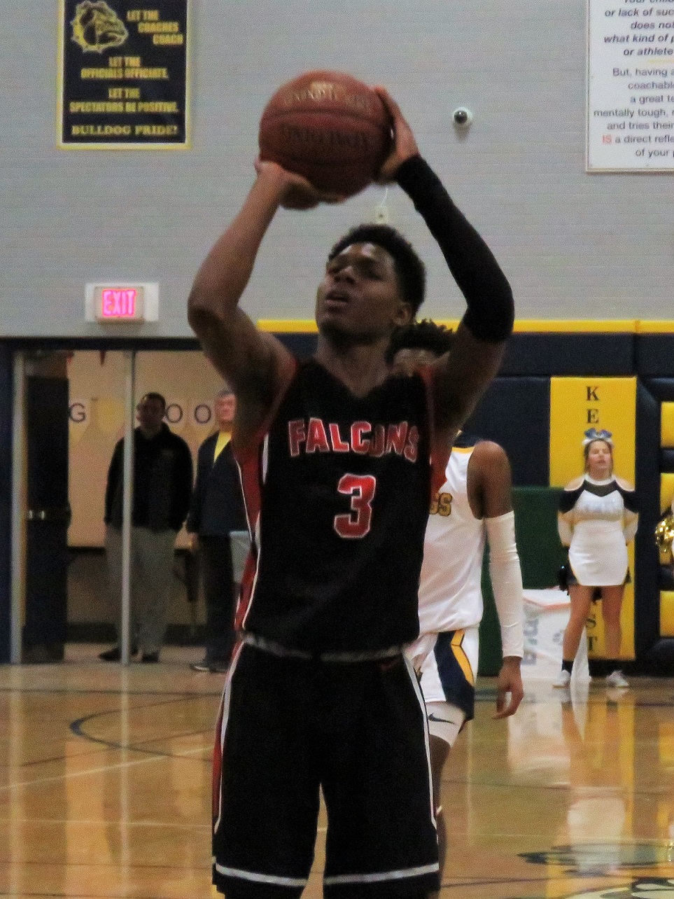 Raejaun Smith sinks a free throw late in the game to help the Falcons secure a victory. Smith had 14 points in the win. (Photos by David Yarger) 