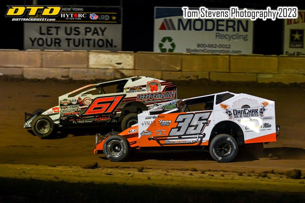 Derek Wagner (61) and Cameron Tuttle (35T) in DIRTcar Sportsman action this past Friday night. (Photo by Tom Stevens)