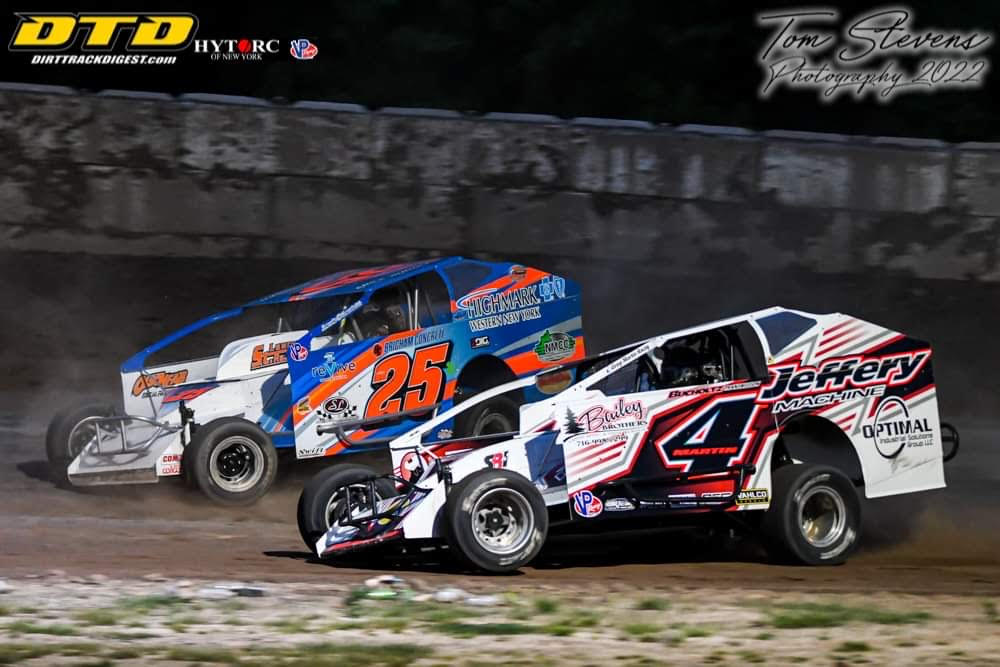 Erick Rudolph (25) leading Greg Martin (4) in 358 feature action. (Photo by Tom Stevens)