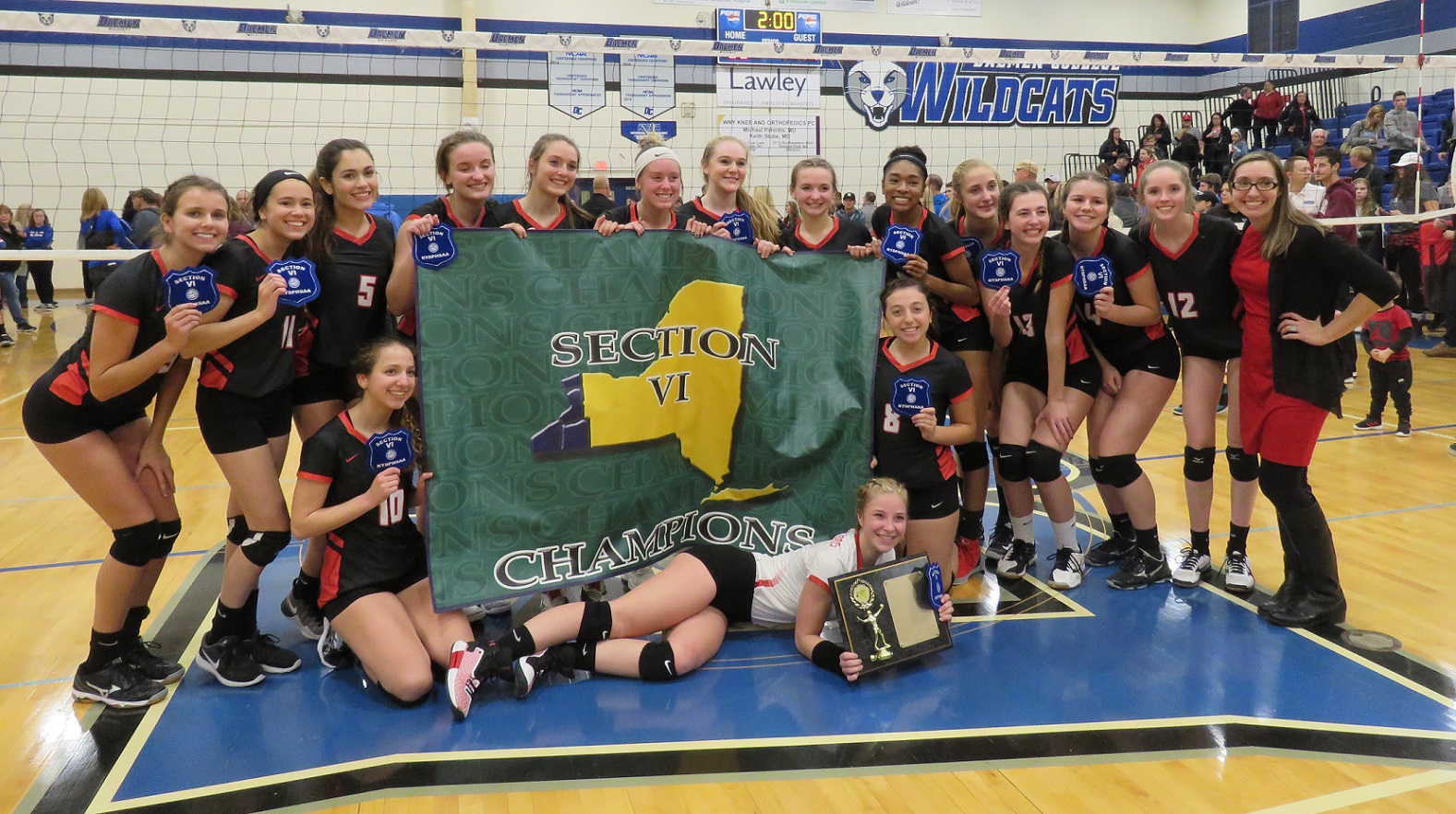 The Niagara-Wheatfield Falcons pose following the team's Class A Section VI championship. (Photos by David Yarger)