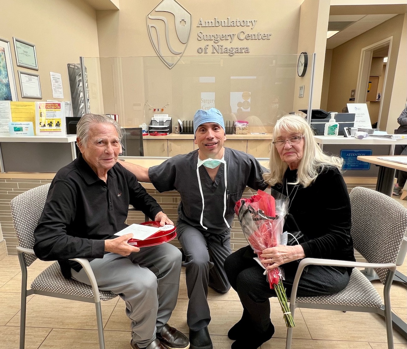 Dr. Michael J. Endl presents Valentine's Day gifts to Sam and Diane Sansone, who both had cataract surgery together on the holiday. (Photos courtesy of Fichte, Endl & Elmer Eyecare)