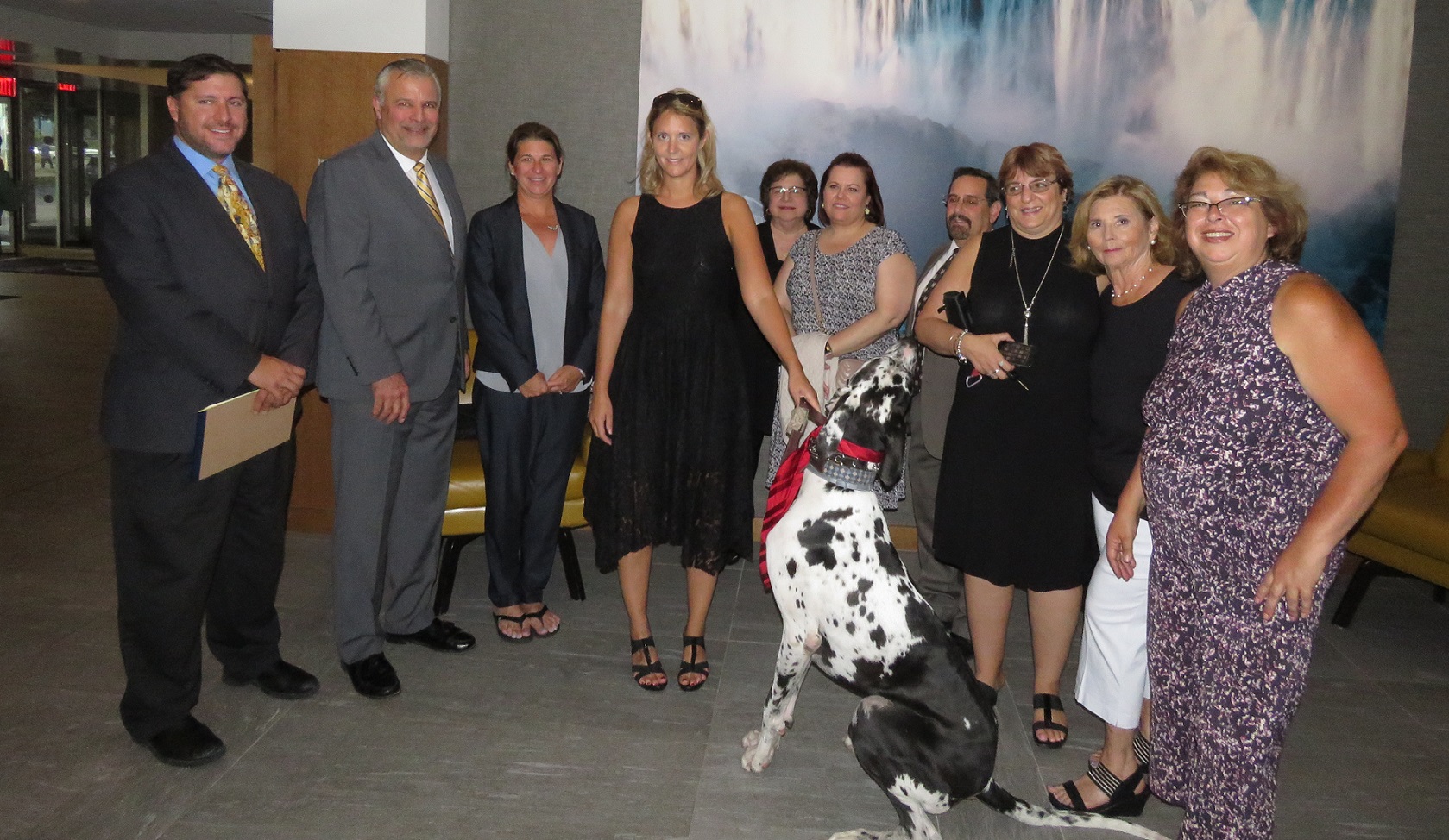Niagara SPCA President Bob Richardson (left) alongside new Executive Director Tim Brennan, with current Executive Director Amy Lewis (middle, with her dog) and the rest of the SPCA board. (Photo by David Yarger)