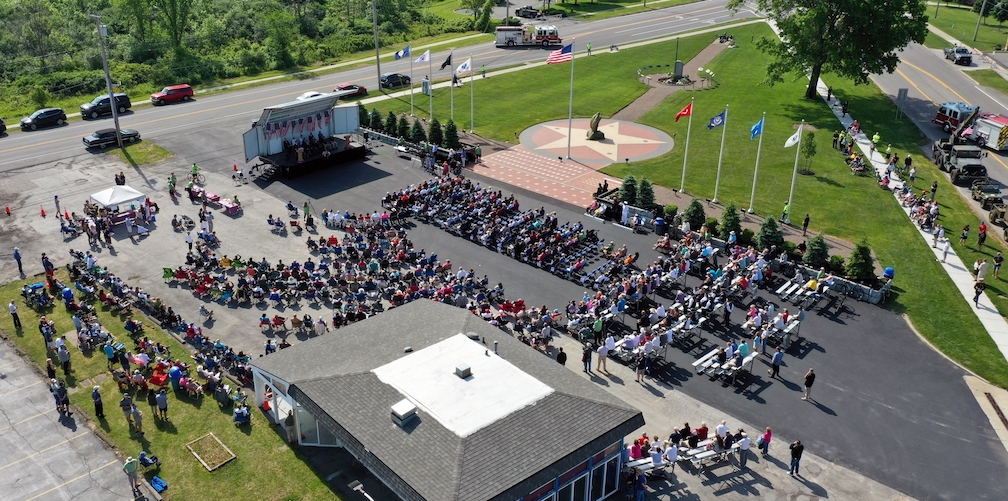 Crowds gathered to watch the DeGlopper Memorial unveiling on Saturday. (Image by K&D Action Photo and Aerial Imaging)