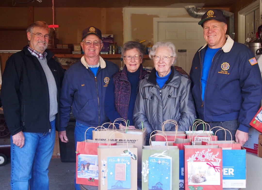 From left, Jim Sharpe, Ray DeGlopper, Pat Shaw, Sheila Colan and Rick Bonarek with some of the holiday gift bags to be donated to veterans at VA Hospital.