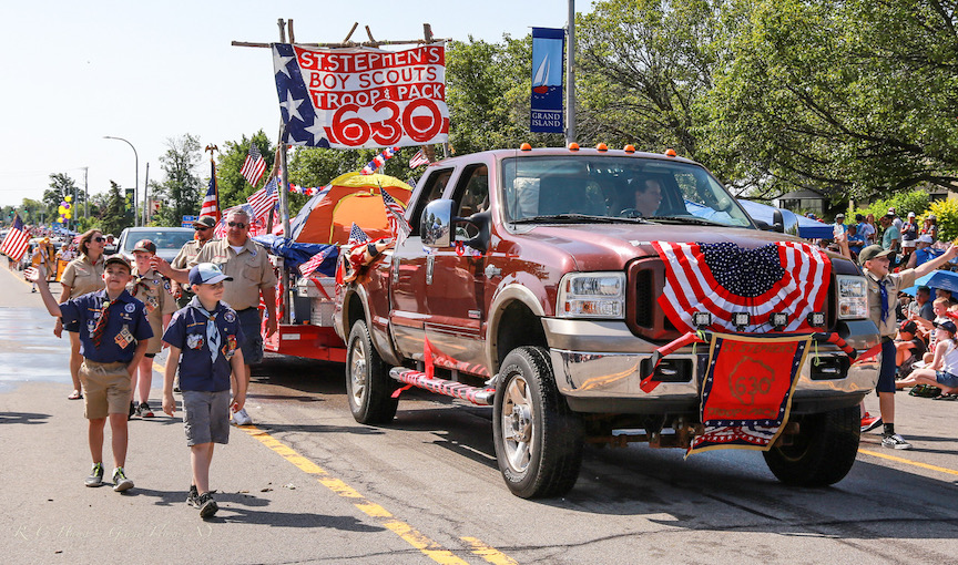 Grand Island held its signature Fourth of July festivities earlier this week. Pictured is St. Stephen's Boy Scout Troop and Pack 630. (This photo by Robert Haag)