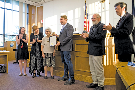 Lenore Tetkowski of Grand Island was honored with a proclamation at the Grand Island Town Board's meeting on Monday. From left: councilwomen Jennifer Baney and Beverly Kinney; Tetkowski; Town Supervisor Nathan McMurray, and councilmen Pete Marston and Mike Madigan. (Photo by Larry Austin)