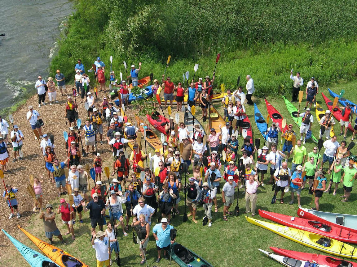 Participants gather for a group photo at a previous Paddles Up Niagara Event. The 15th annual Paddles Up Niagara will be held Saturday, July 31, at Beaver Island State Park. (Photo submitted by Niagara River Greenway Commission)