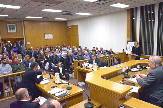 An overflow crowd listens during the first presentation to the Grand Island Town Board Monday regarding a proposed warehouse/distribution center, widely assumed to be for e-commerce giant Amazon. (Photo by Larry Austin)