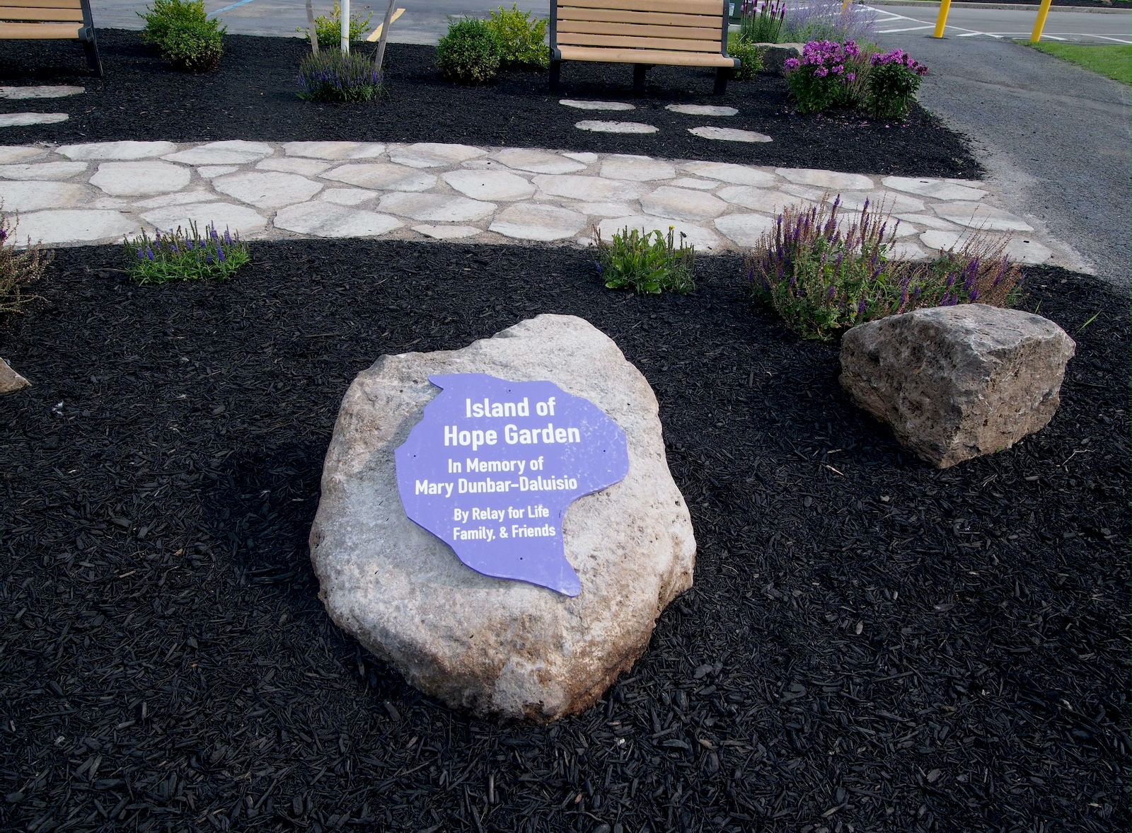 Relay For Life: The Garden of Hope is located near the concession stand at Veterans Park. A plaque honors the memory of Mary-Dunbar-Daluisio, longtime co-chair of Grand Island's cancer awareness event.
