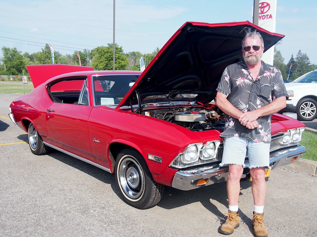Mark B. Gollwitzer and the Chevrolet Chevelle that once belonged to his late brother, Peter.