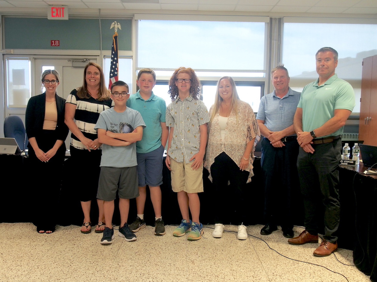 Veronica Connor Middle School students, who were honored for their role in raising $2,000 to buy a well for South Sudan, with the Grand Island Board of Education.
