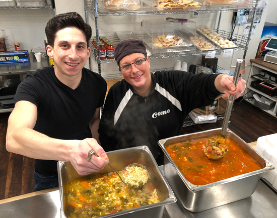 Dominic Colucci and Dawn Antonacci serve up The Como Restaurant's signature soups inside the family deli in Lewiston.