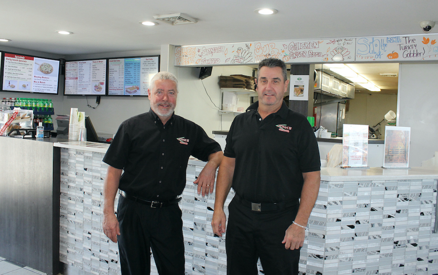 John's Pizza & Subs owners Gene Mongan, left, and Kurt Raepple at their store at 2131 Grand Island Blvd., Grand Island, which they opened in 1989. They also own John's Pizza & Subs locations at 1435 Niagara Falls Blvd., Tonawanda (the original restaurant, purchased in 1982); 680 Campbell Blvd., Getzville, which opened in 1991; and 4241 Delaware Ave., Tonawanda, which opened in 2001.
