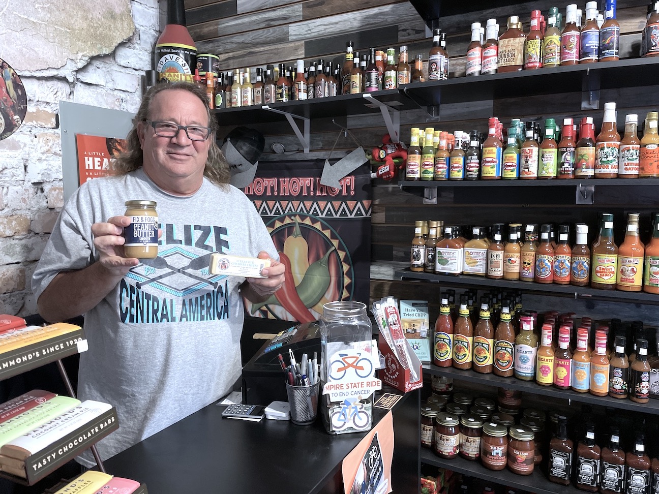 Sgt. Peppers owner Neil Garfinkel poses with some of the `Etc.` items offered in his store.