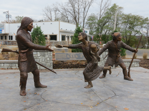 The Tuscarora Heroes monument on Center Street in Lewiston honors the Tuscarora Nation's brave actions that saved the lives of Lewiston citizens who were fleeing British forces who had invaded the U.S. from Canada in 1813. The bronze memorial was created by artist Susan Geissler. (File photo)