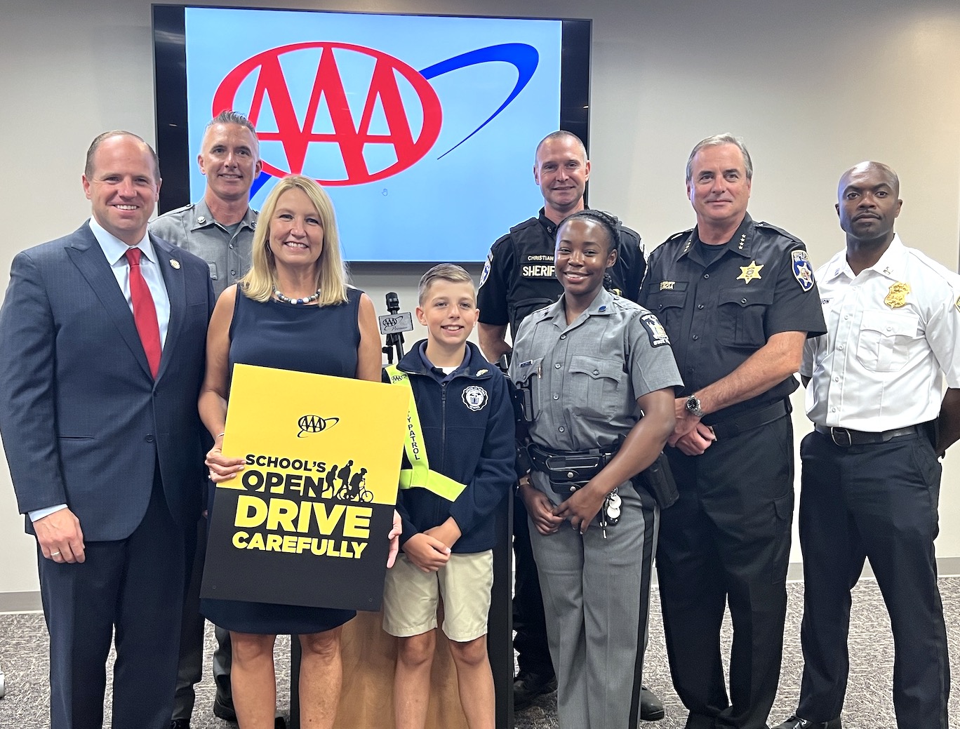 Local leaders joined with AAA and members of law enforcement to promote back-to-school safety. (AAA photo)